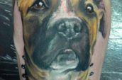 tattoo of dog on leg